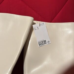 H&M Cream boot, new with tag 84.99 asking 60.00 Gorgeous!!